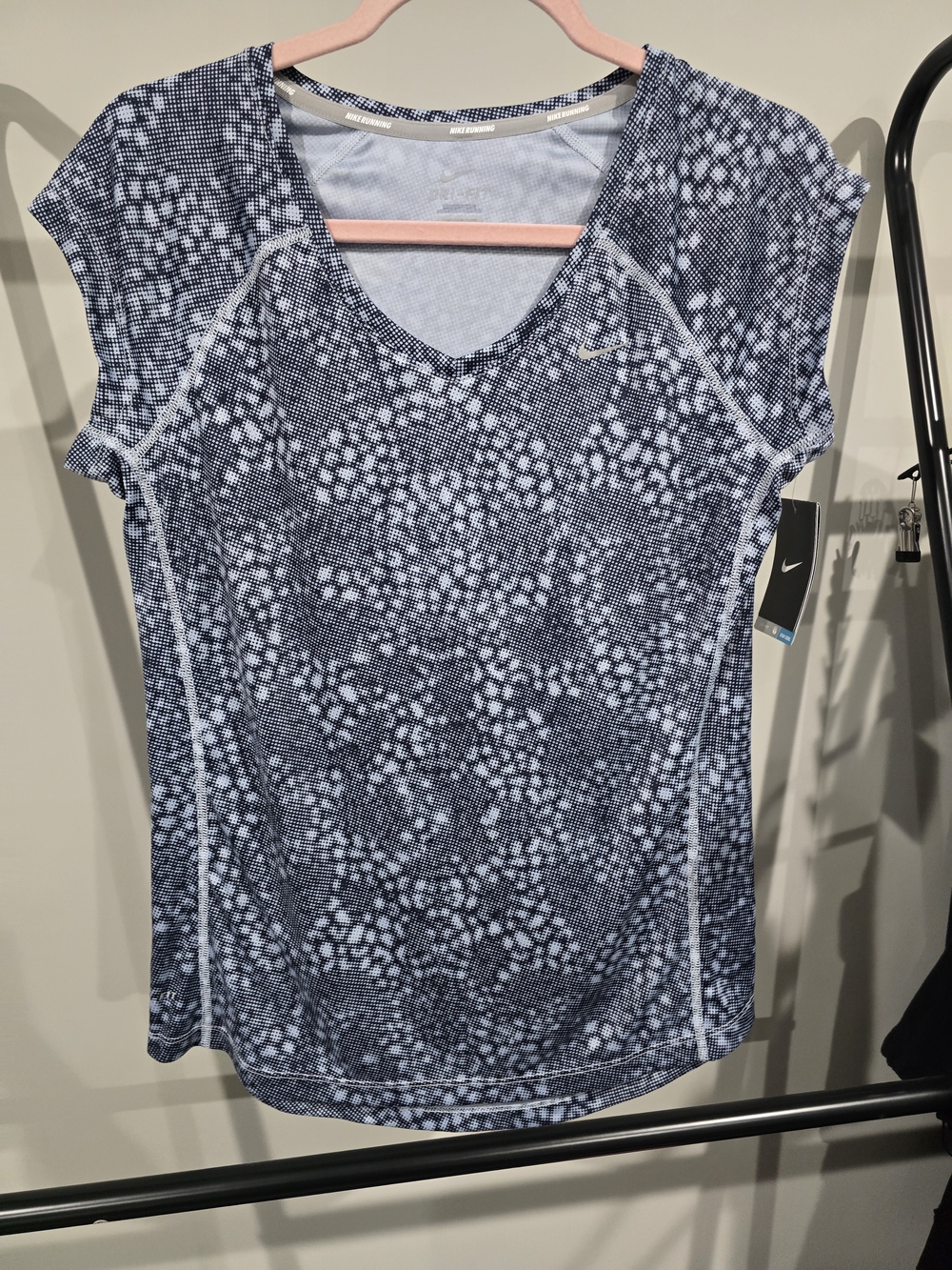 Nike Women’s Navy and White Patterned Short-Sleeve V-Neck Top